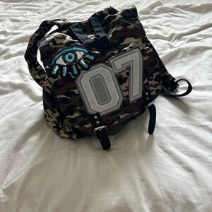 Claire's Camo Backpack with Design| childhood staple